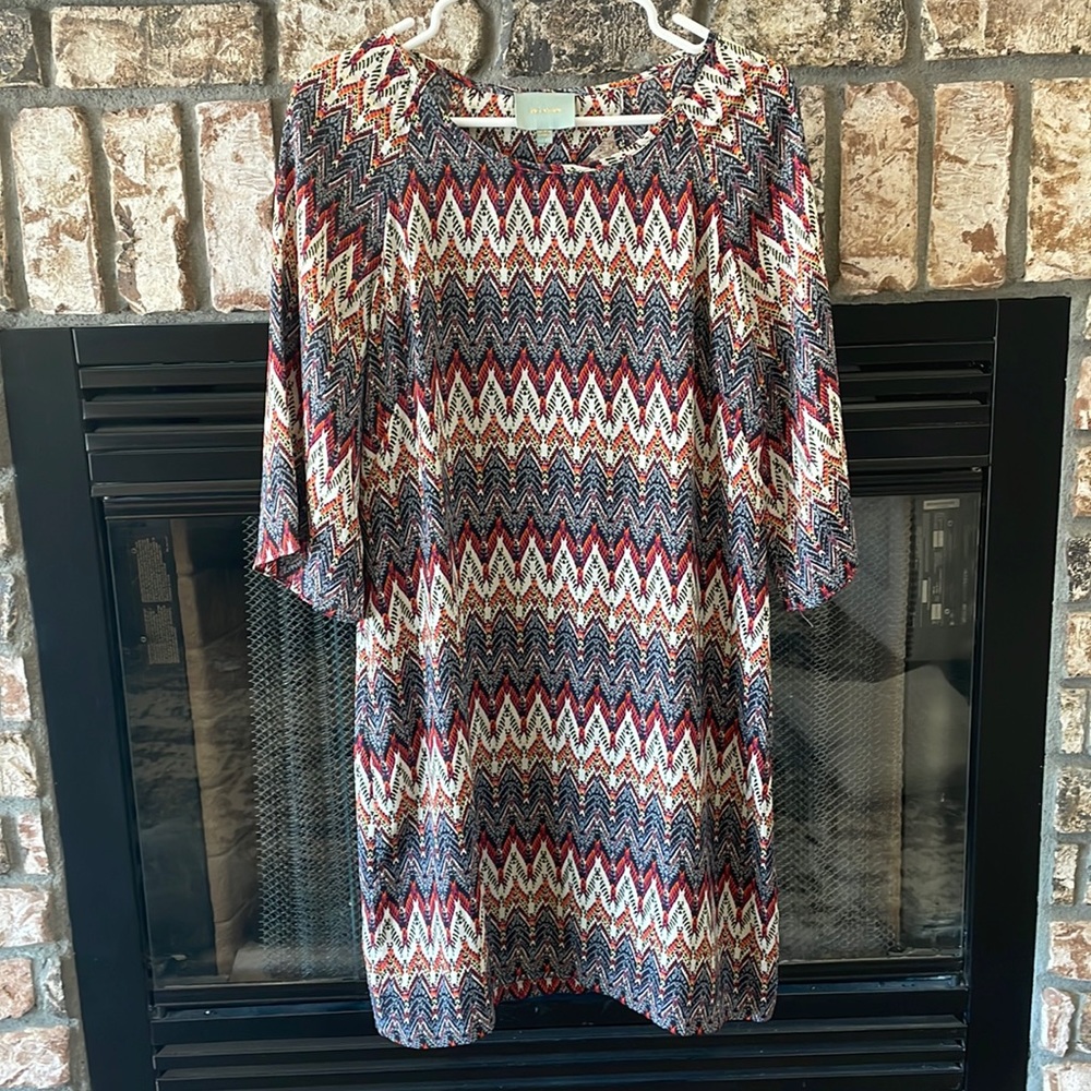 Skies are Blue bell sleeved dress. Size L. Chevron like pattern.